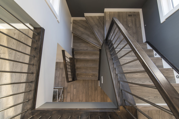 beautiful-shot-modern-house-staircase_181624-3129